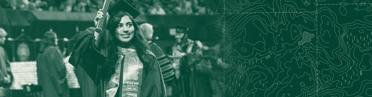 Woman graduating with cap and gown on